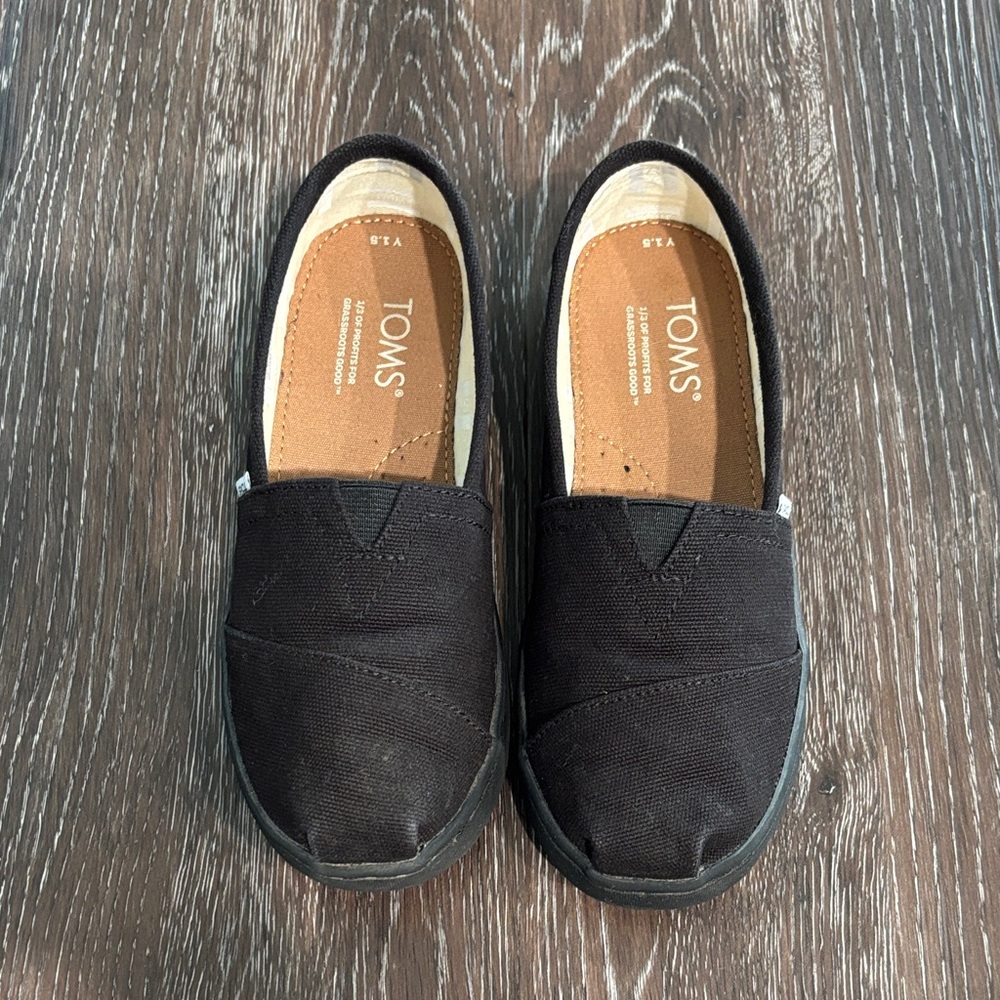 TOMS Black Canvas Slip-Ons